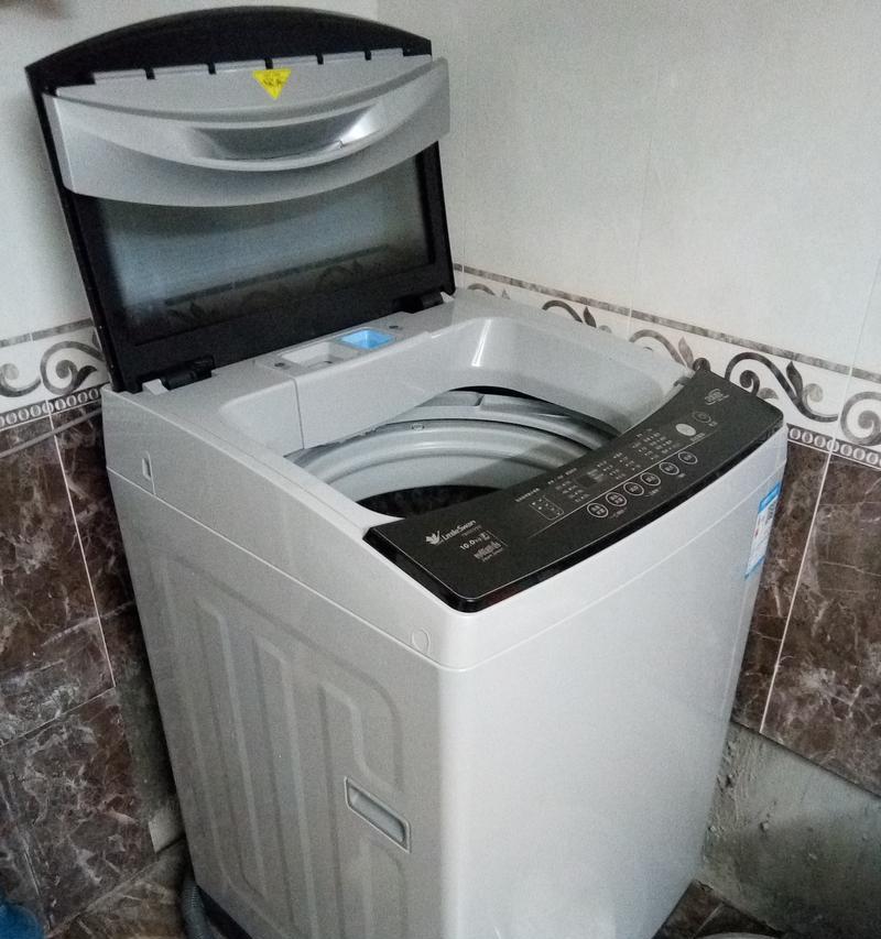 解决滚筒洗衣机机门打不开和噪音大的问题（轻松应对滚筒洗衣机故障）
